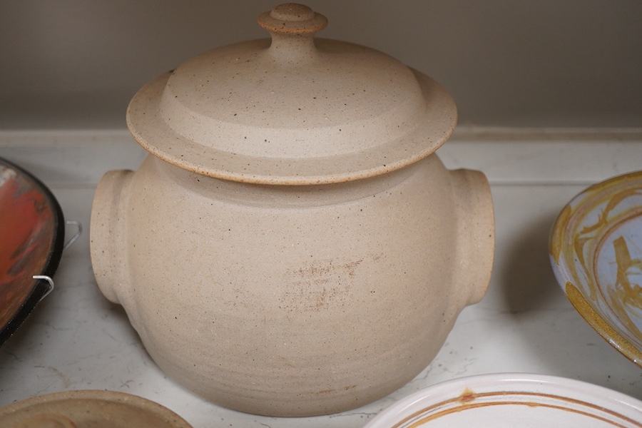 An Andrew Hill charger, 44cm diameter, two Mohammed Hamid (Lewes) bowls and two unsigned Bernard Leach pottery jars and covers